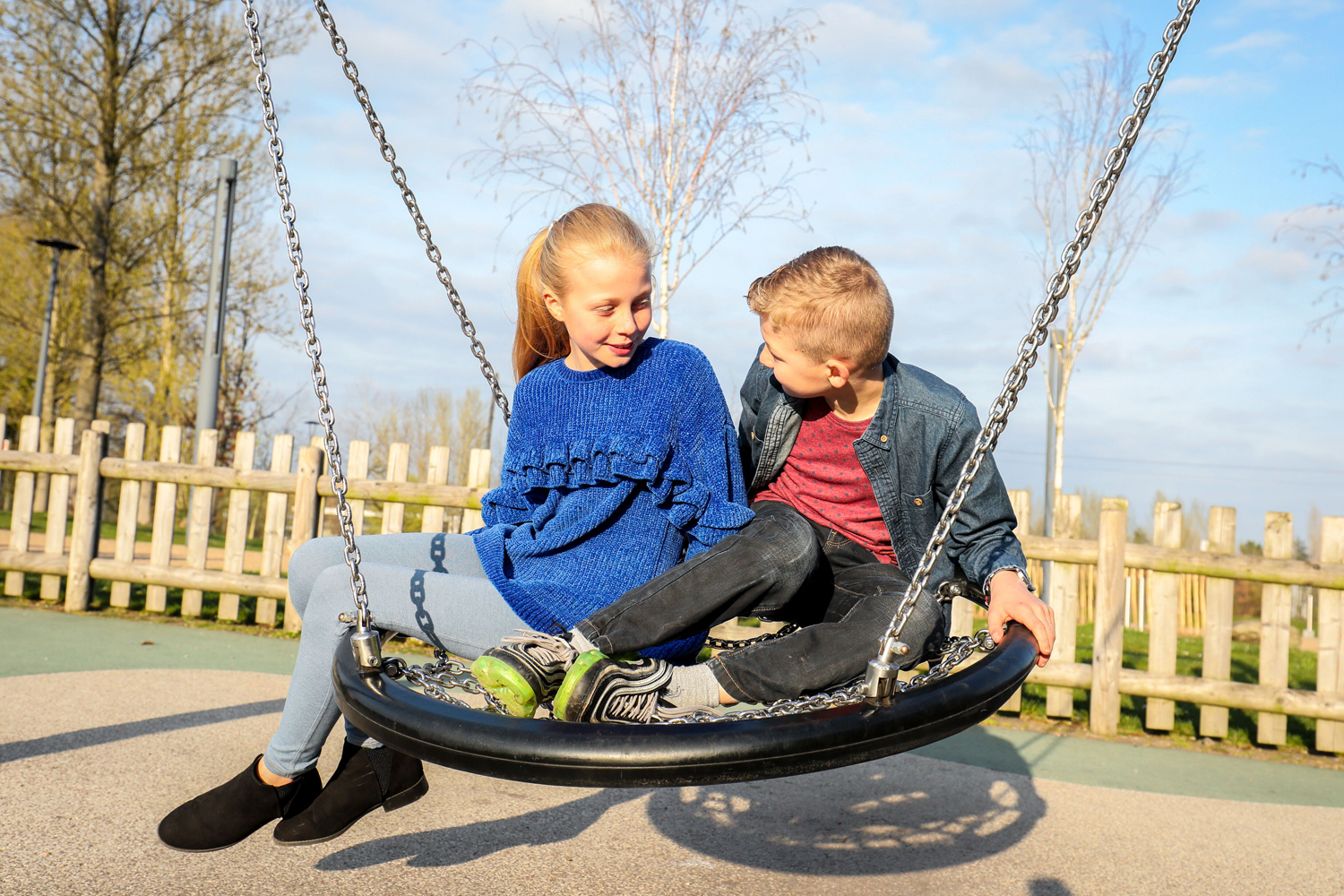 Picture of two children on a nest swing in Telford Town Park