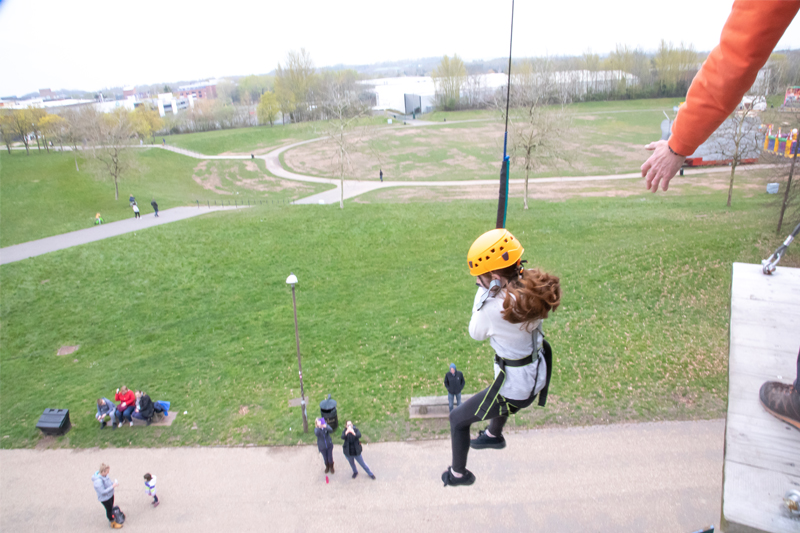 Image of a girl on the tree course