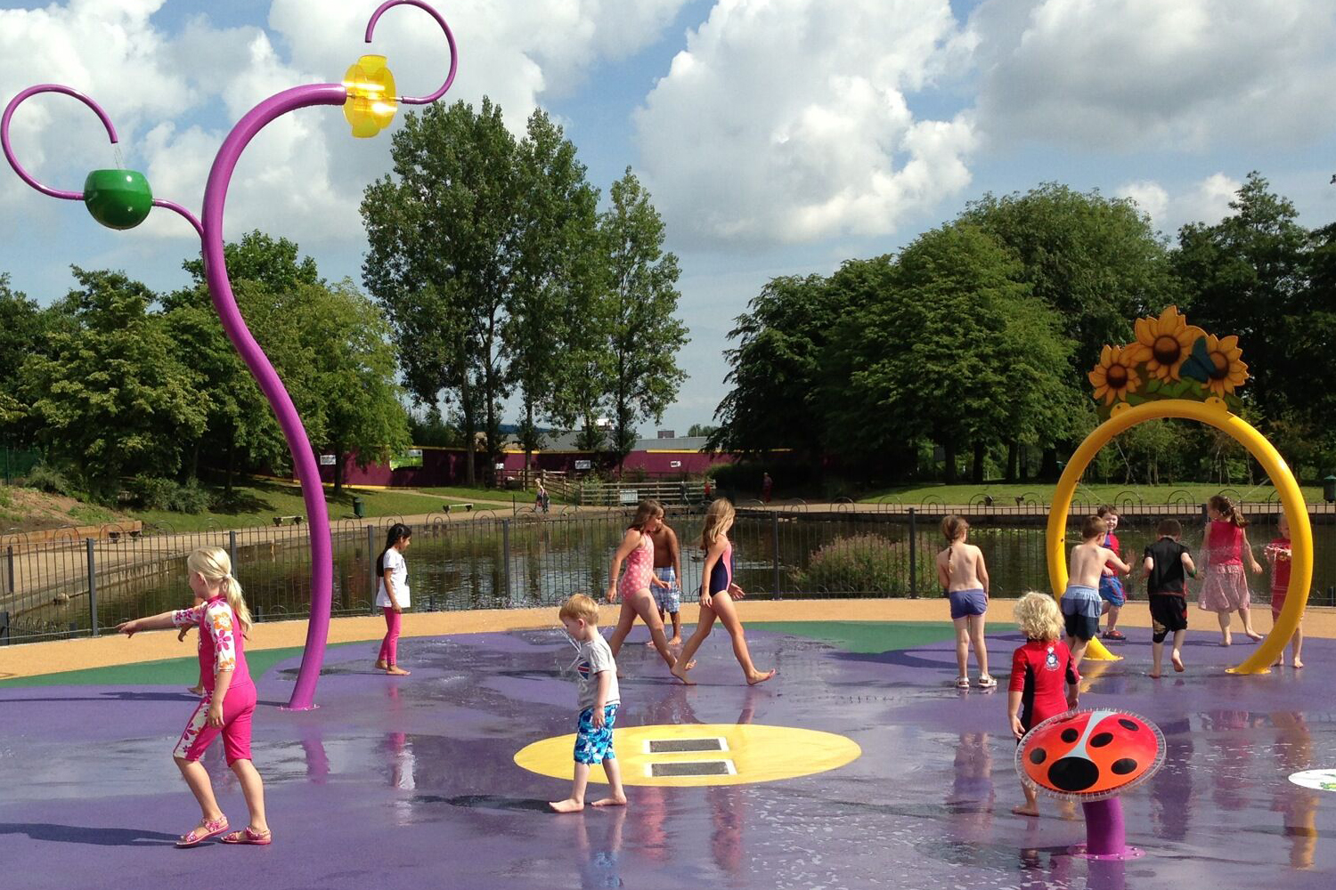 Illustration of children playing in the water play area at Telford Town Park